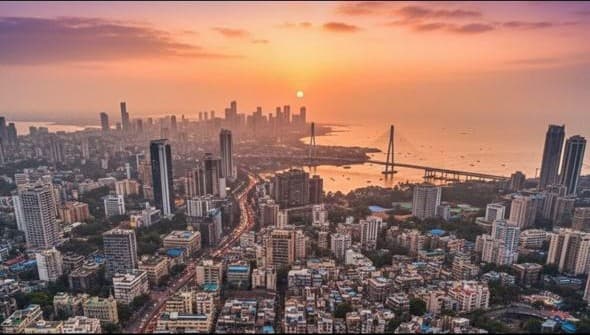 Sunset over the Mumbai skyline with the cable-stayed Bandra-Worli Sea Link crossing the bay